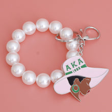 Load image into Gallery viewer, Pink Green Hat Pearl Keychain
