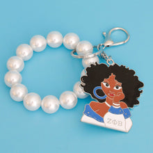 Load image into Gallery viewer, Blue White Woman Pearl Keychain
